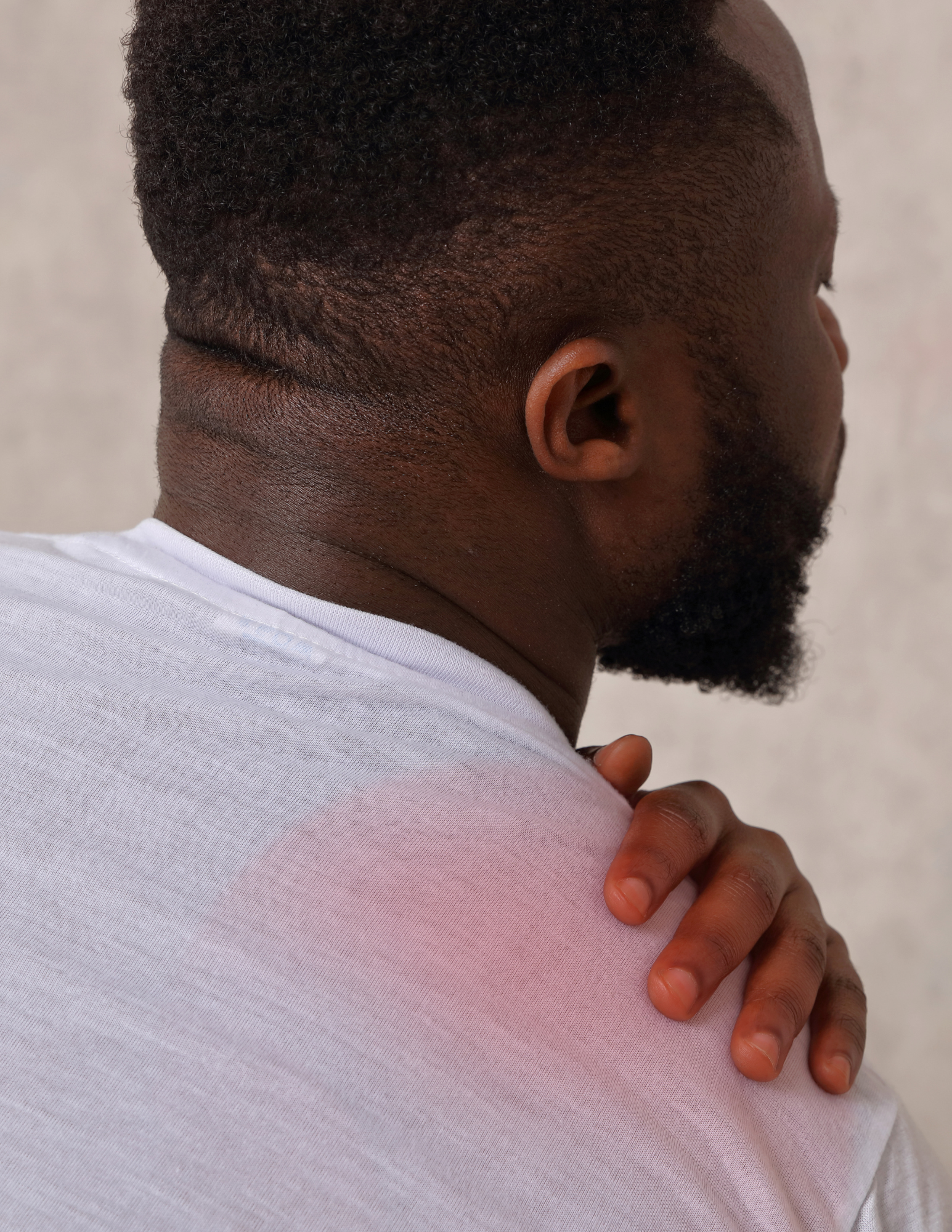 man with shoulder pain